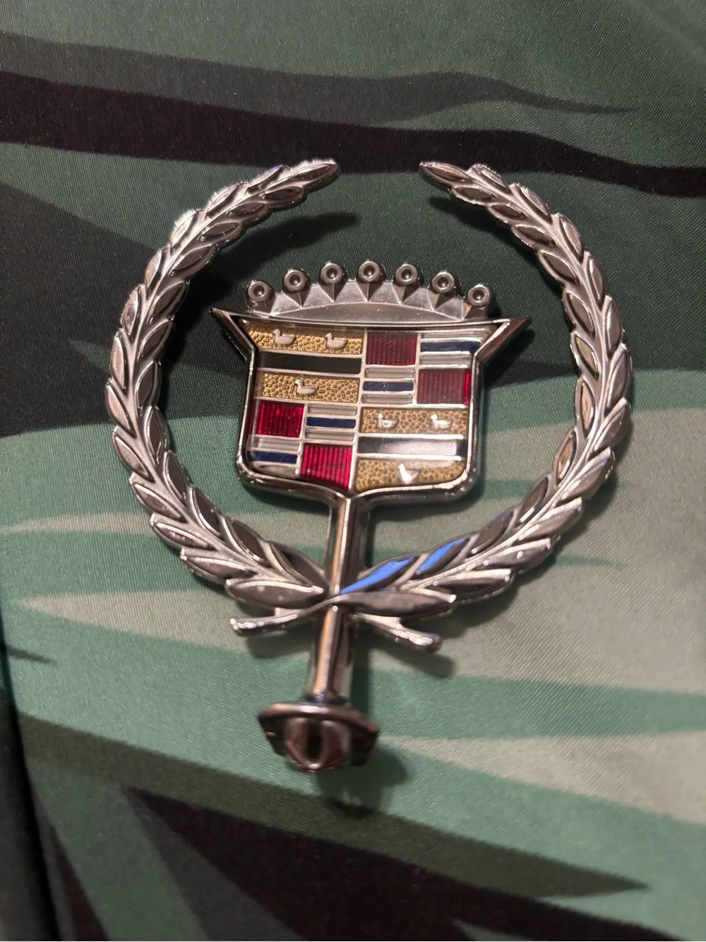 Cadillac crest hood